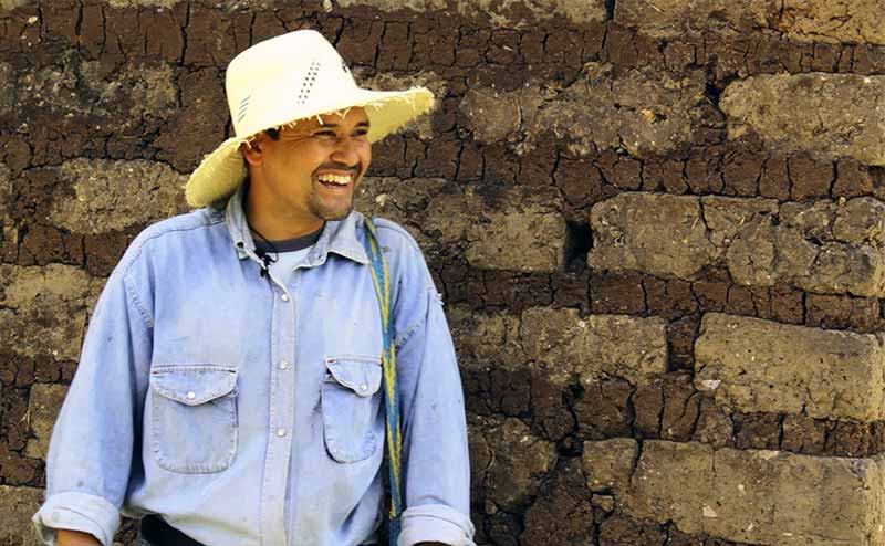 Juan Carlos Manueles at his farm 